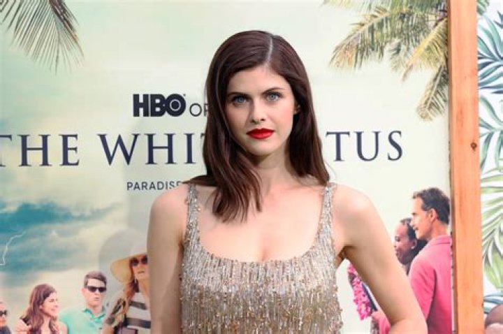 Alexandra Daddario Shows Off Little Black Dress While Holding Juicy Burger — Celebwell